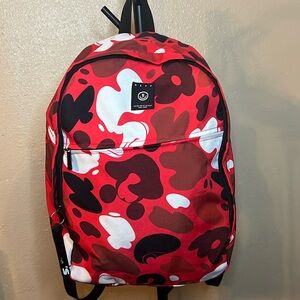 Neff Mickey red, white, and black backp 100% polyester